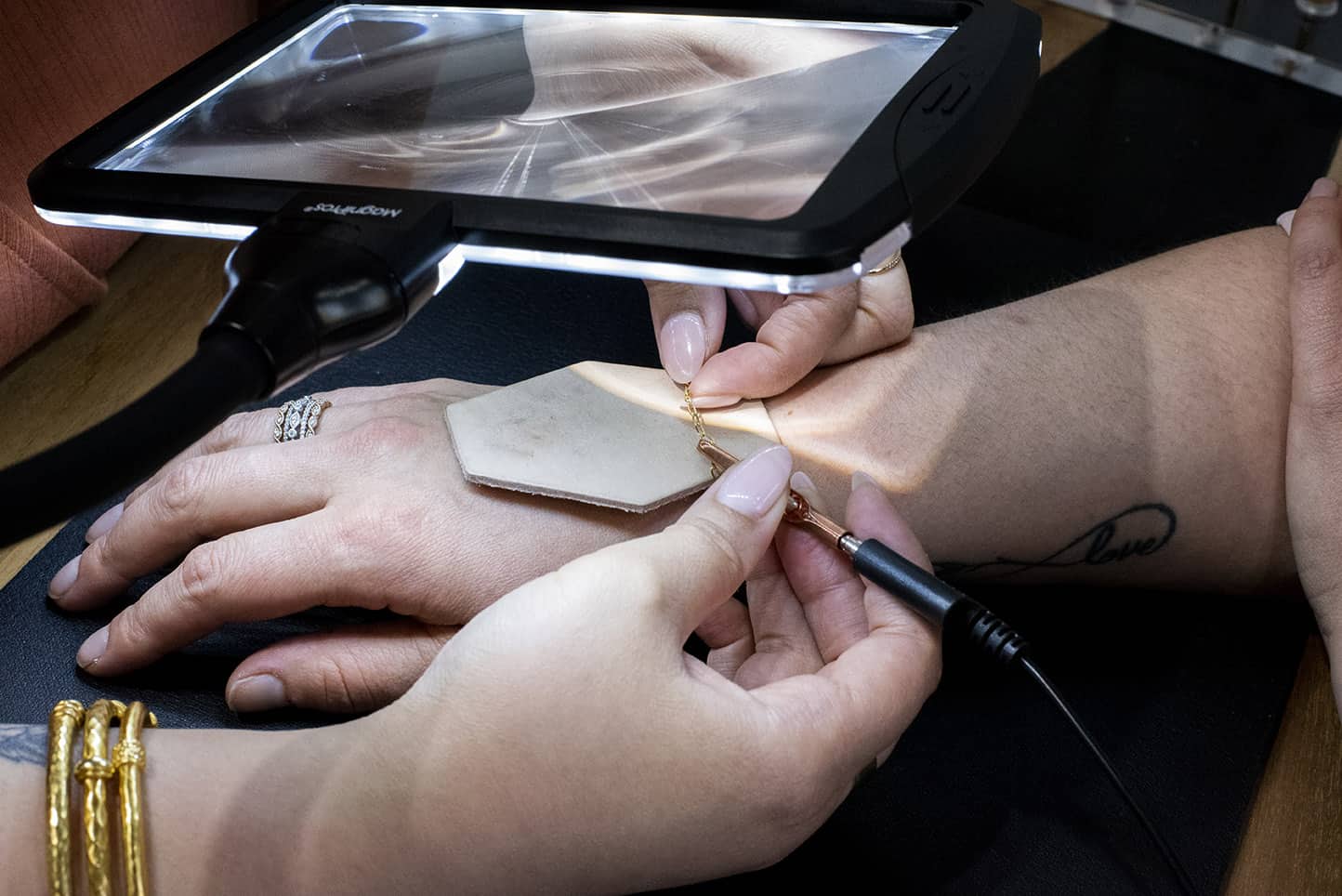 Jeweler Welding a Permanent Bracelet