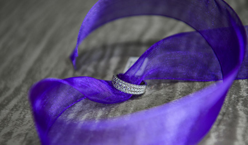 Purple Satin Cloth with a Diamond Wedding Band