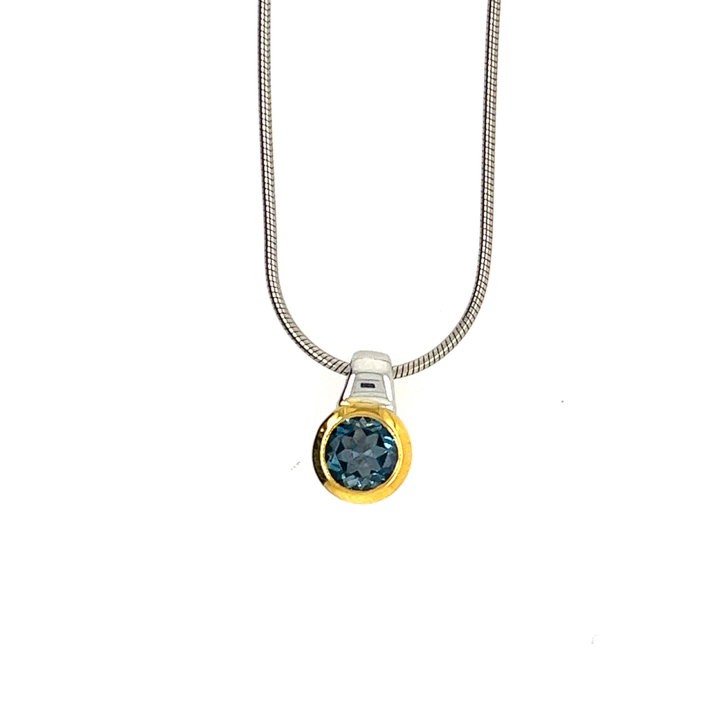 Sterling Silver And Gold Plated Blue Topaz Pendant