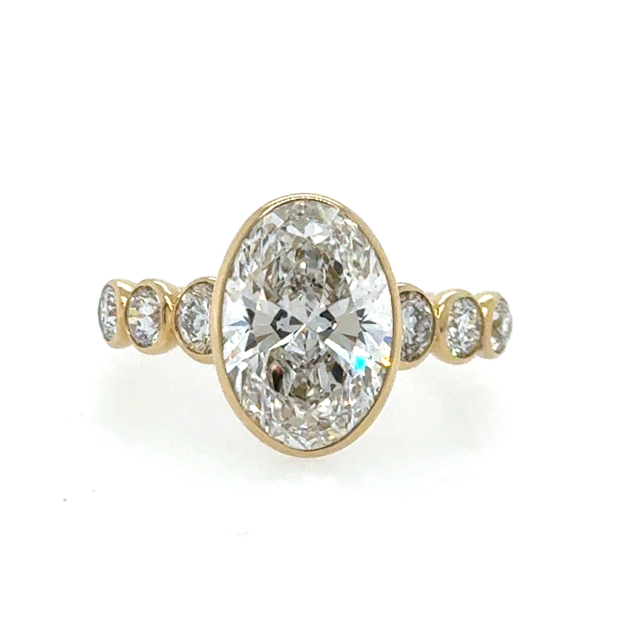 14 Karat Oval Lab Grown Diamond Engagement Ring